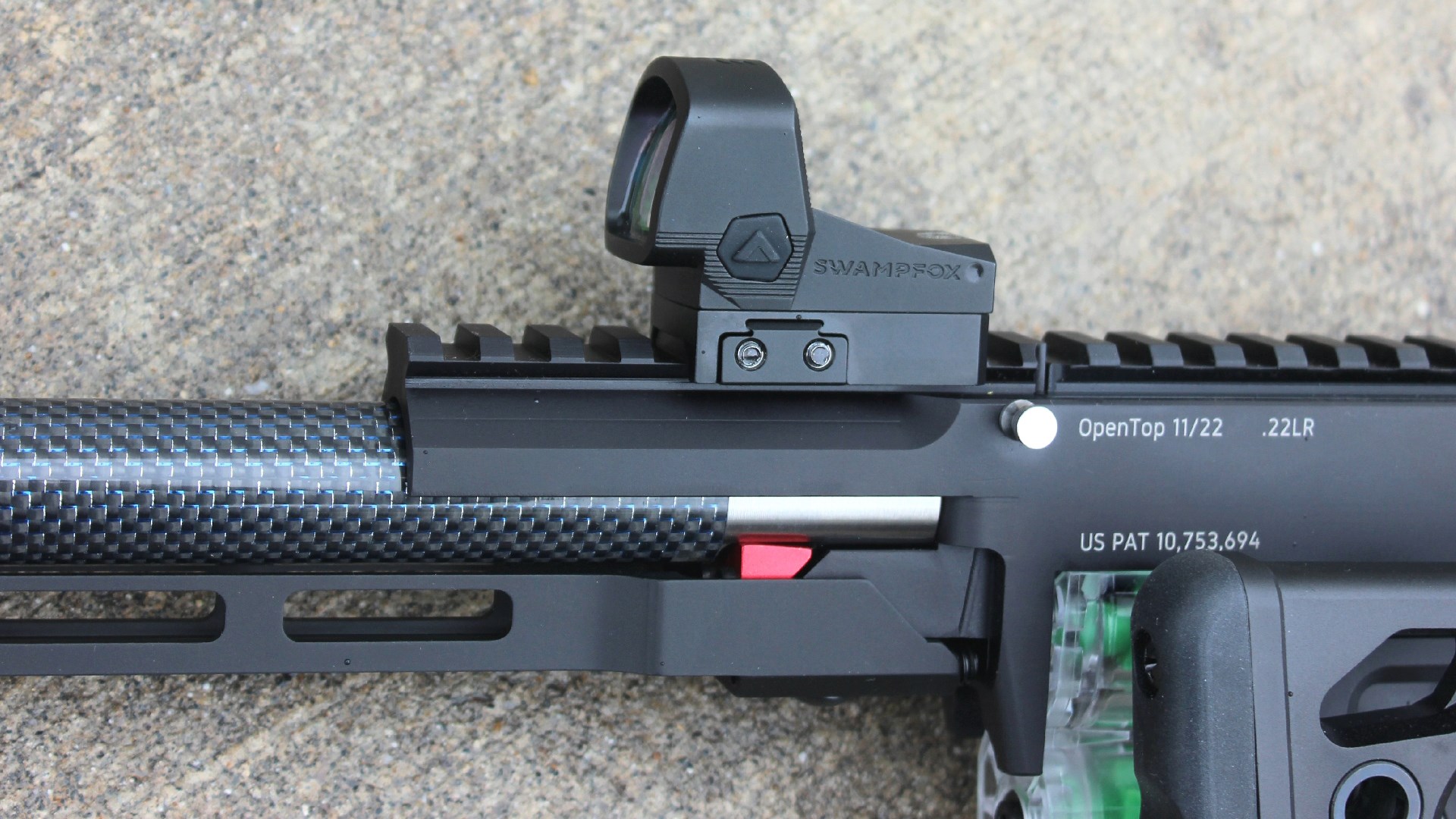 Swamp Fox Justice II red-dot optic mounted on custom rifle .22 Long Rifle