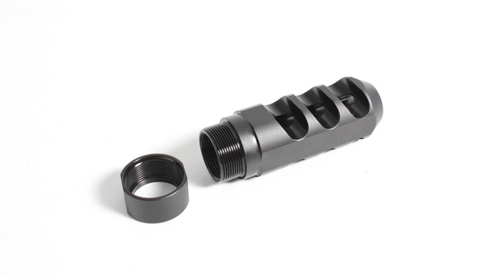 Traditions Pro Series muzzle brake shown on white.