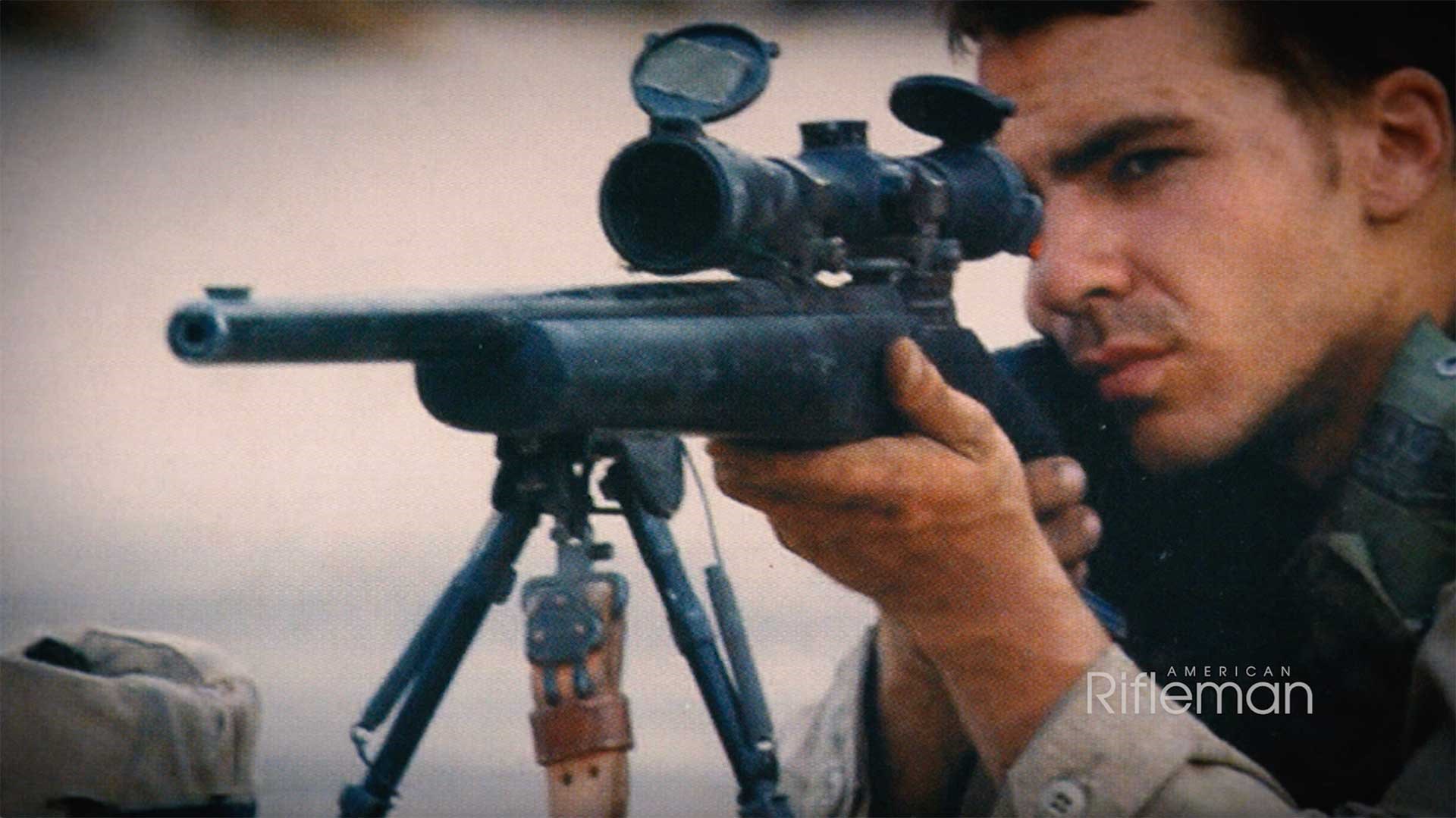 A U.S. Army soldier aiming an M24 sniper rifle equipped with a Leupold riflescope.