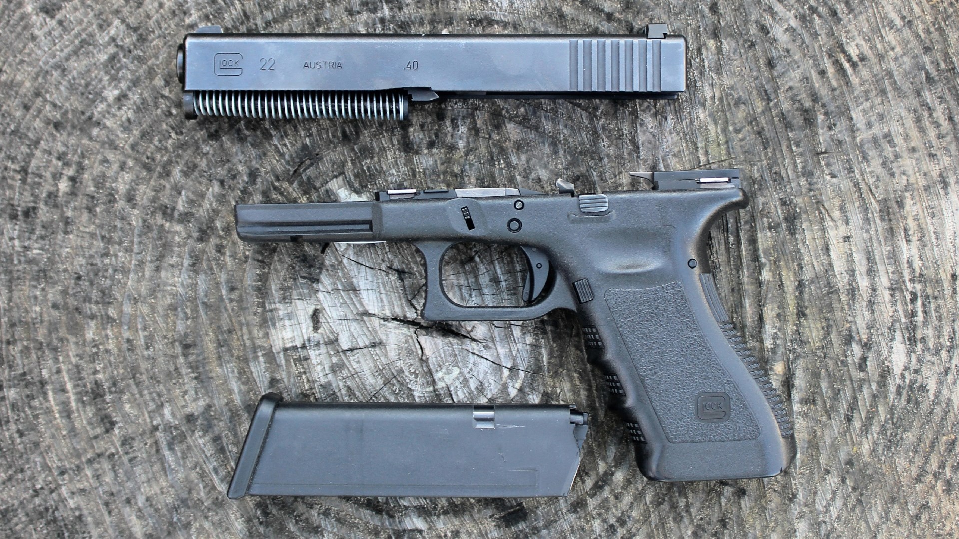 Glock G22 pistol slide disassembled
