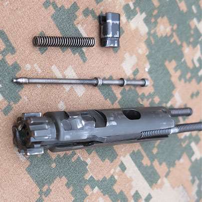 The disassembled bolt carrier group of the ARX 100.