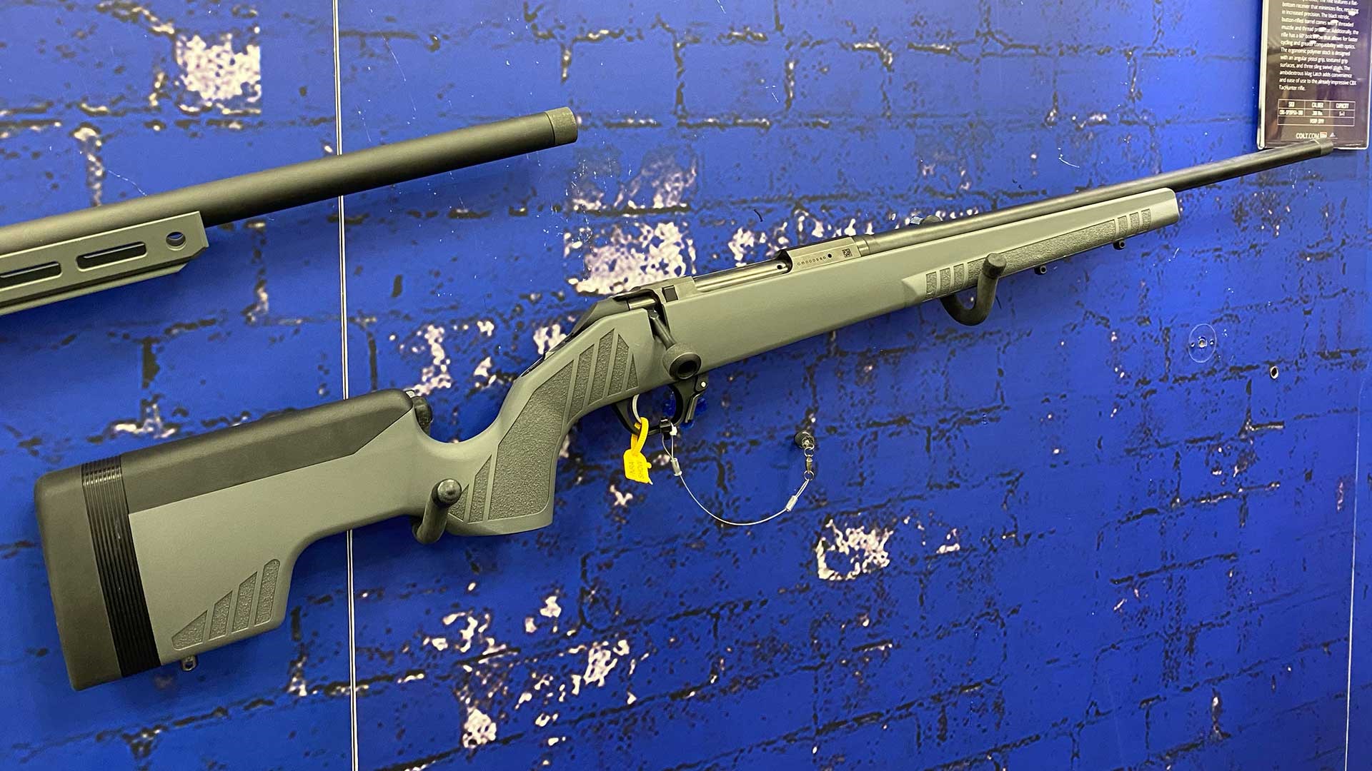 Colt CBX TacHunter hanging on a blue wall at the 2023 NRA Annual Meeting & Exhibits