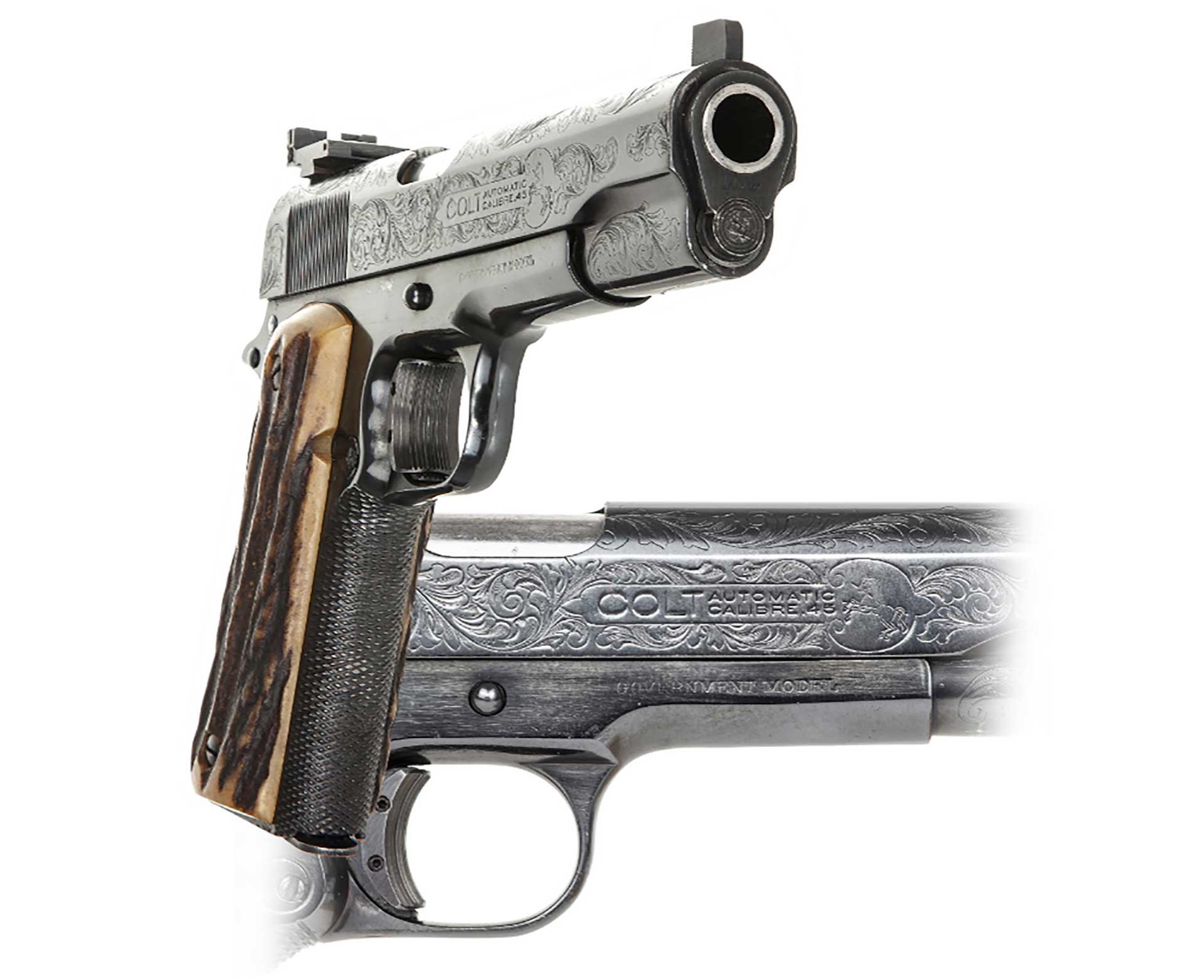 Al Capone's personal 1911 shown from the front and the side, displaying figurative engraving.