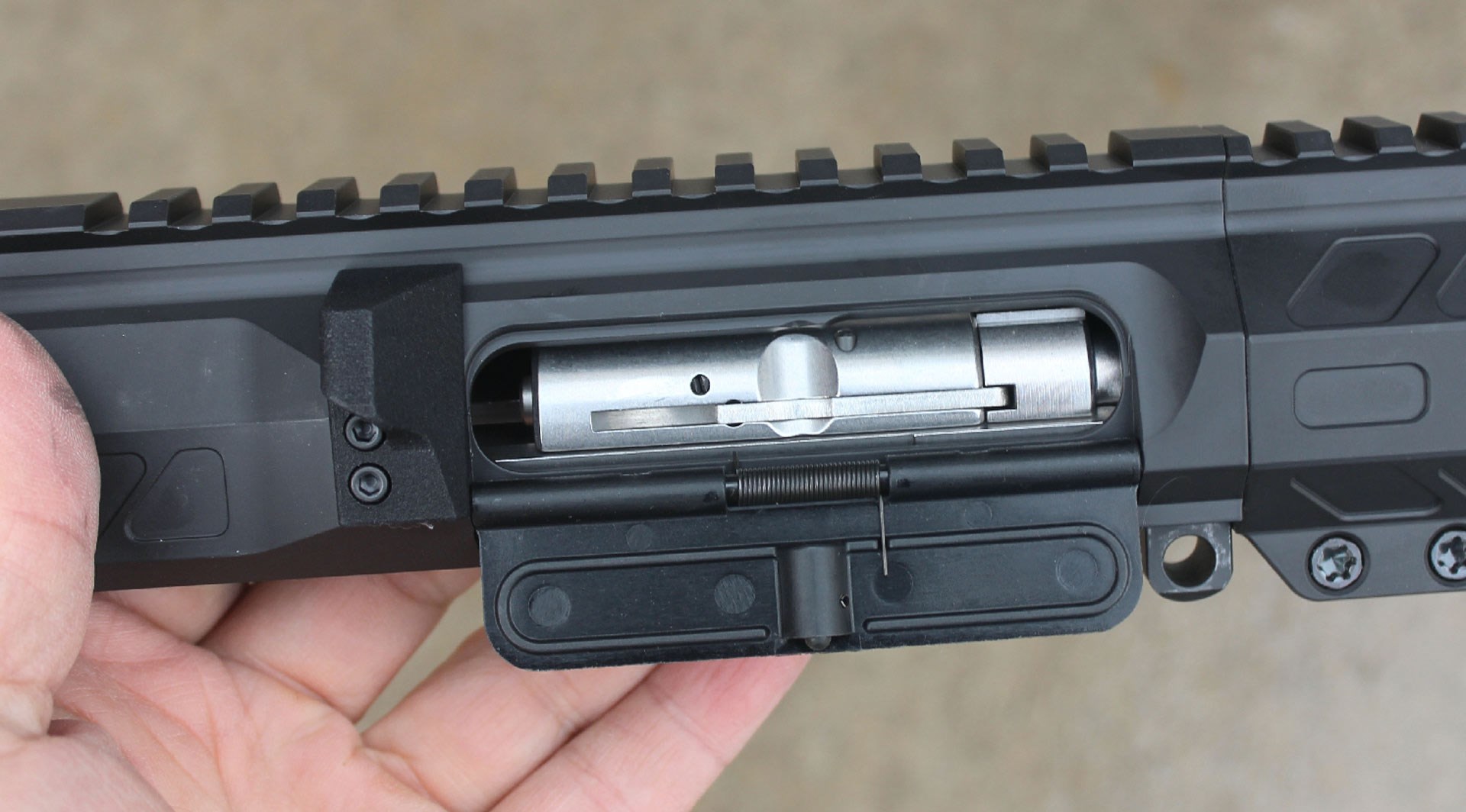 CMMG Mk4 upper receiver pistol handgun closeup metal black and silver