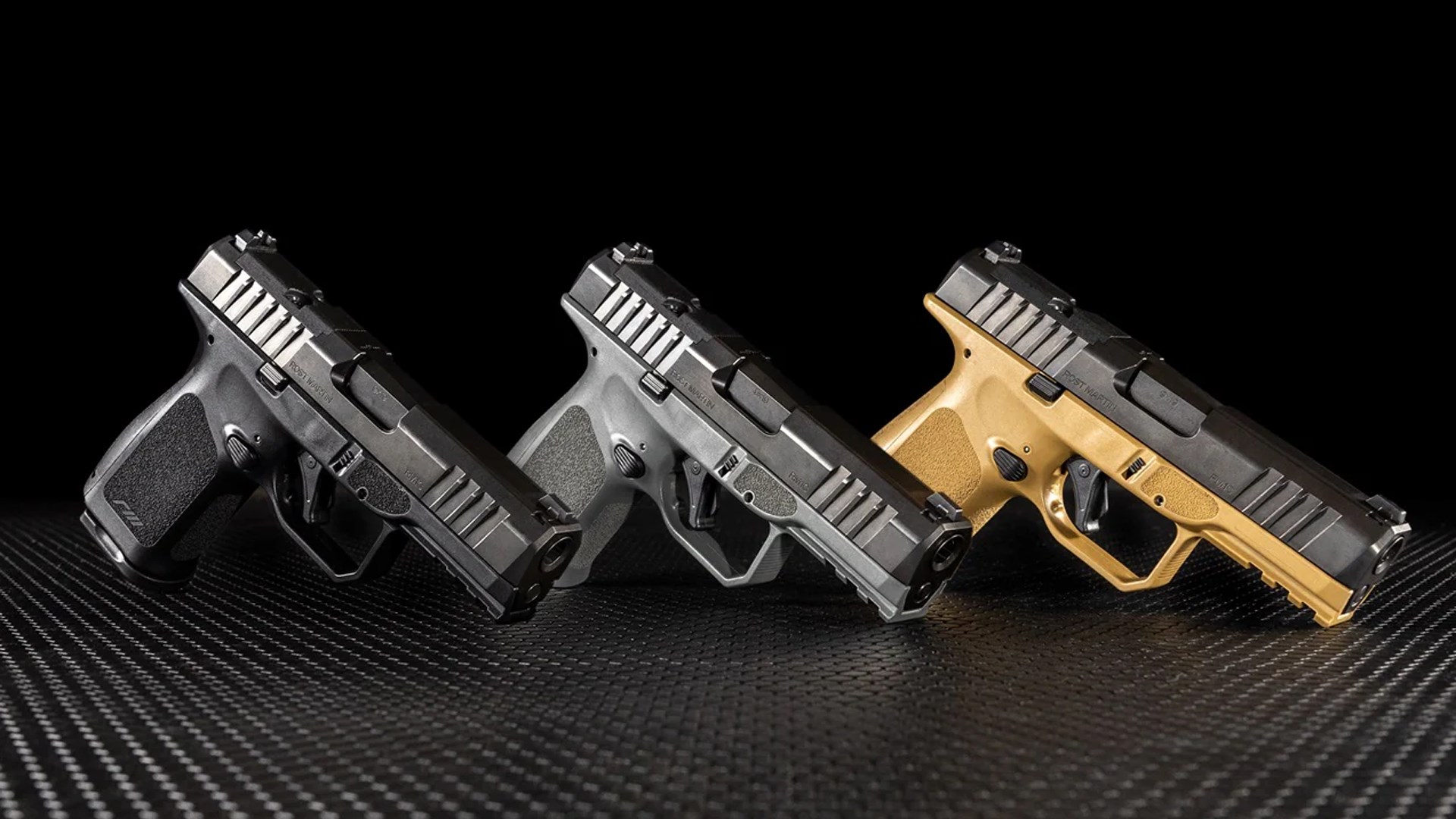 Three Rost Martin RM1C pistols shown with different frame colors.