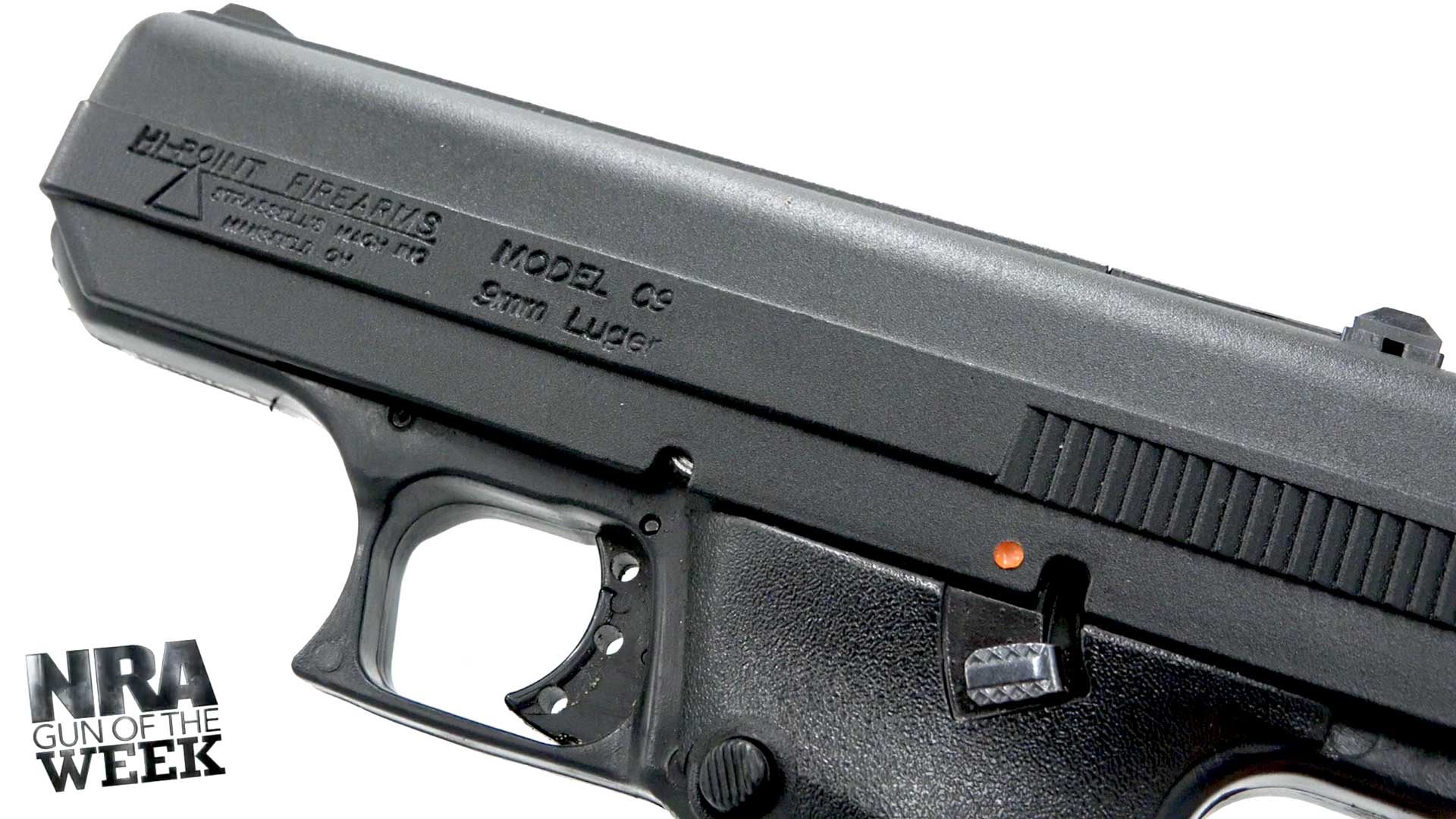 left side gun handgun pistol black metal details slide trigger frame text on image noting "NRA GUN OF THE WEEK"