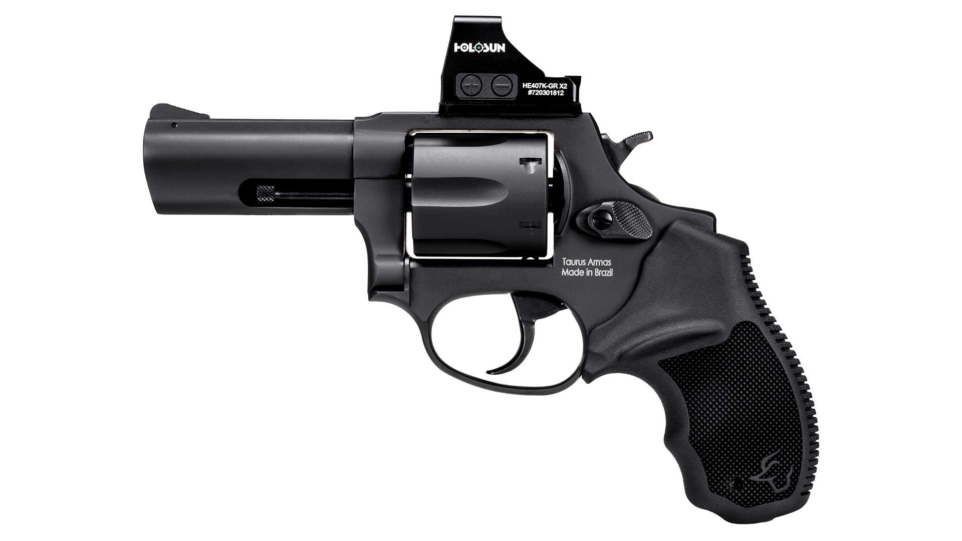 Left side of the all-black Taurus 856 revolver in .38 Special shown on white, with a Holosun red-dot sight mounted on top.