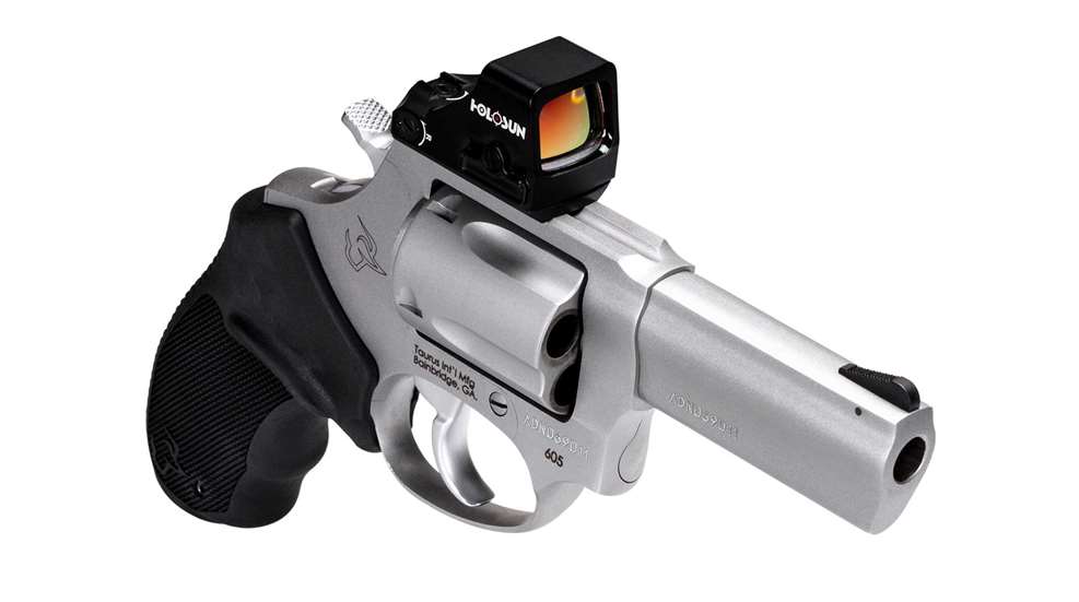 Stainless steel Taurus 605 revolver chambered in .357 Mag. shown with an attached Holosun red-dot sight.