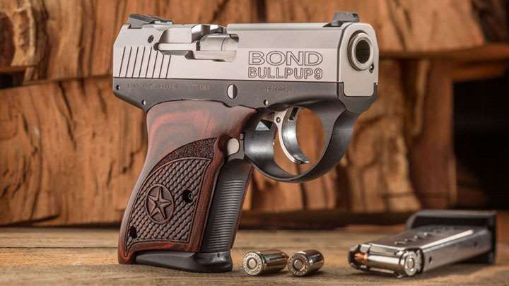 Bond Arms bullpup9 semi-automatic pistol 9 mm stainless steel slide black frame walnut star grips ammunition on table magazine