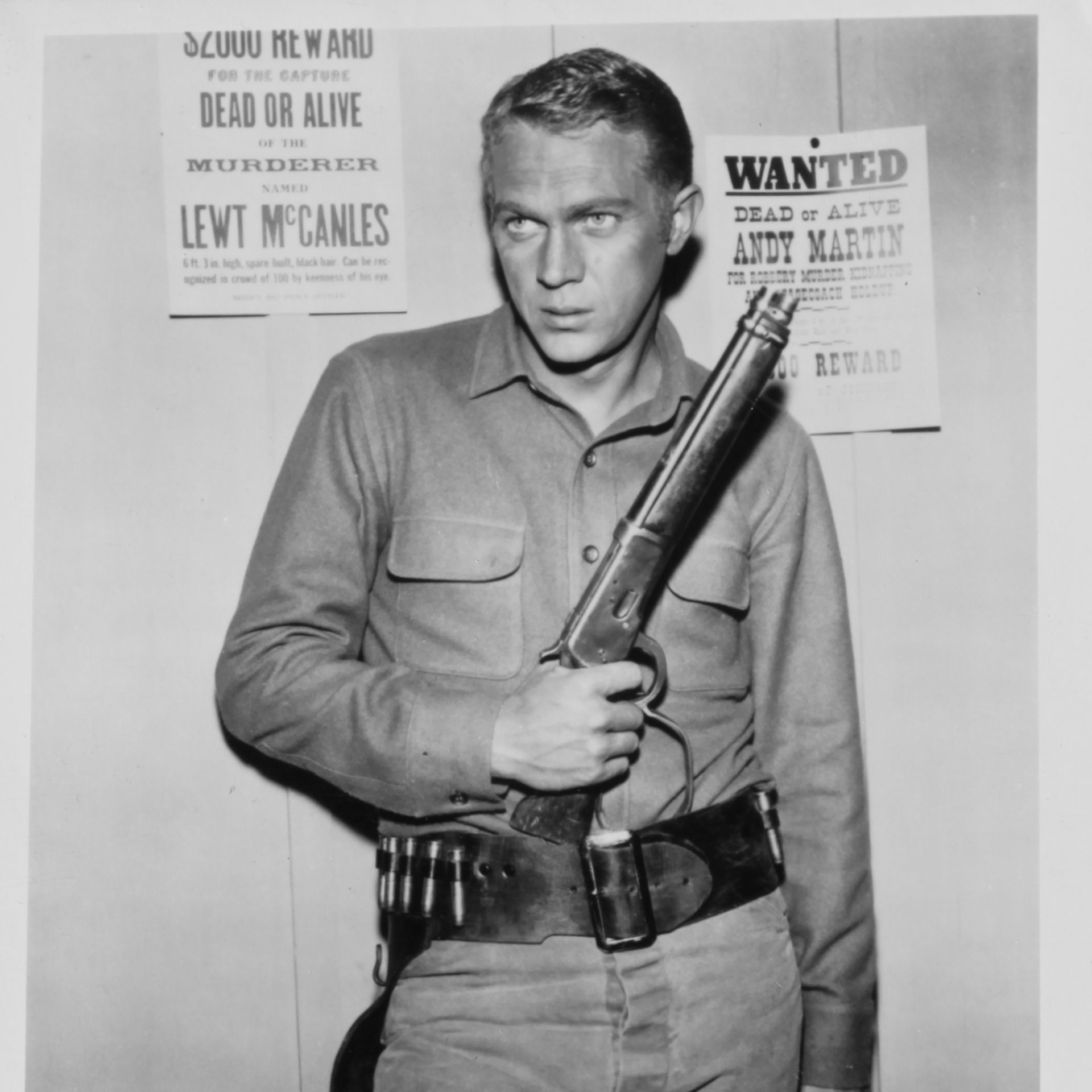 A menacing Steve McQueen, as bounty hunter Josh Randall, poses with the original "Mare’s Leg" he used in the "Wanted Dead Or Alive TV" series.