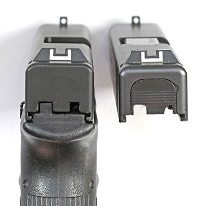 The Tactical Solutions TSG-22 Glock .22 LR conversion kit (pictured installed on left) uses factory Glock sights (compared to a Glock 19 slide on right). This means that they can be replaced with aftermarket sights designed for a Glock dovetail.