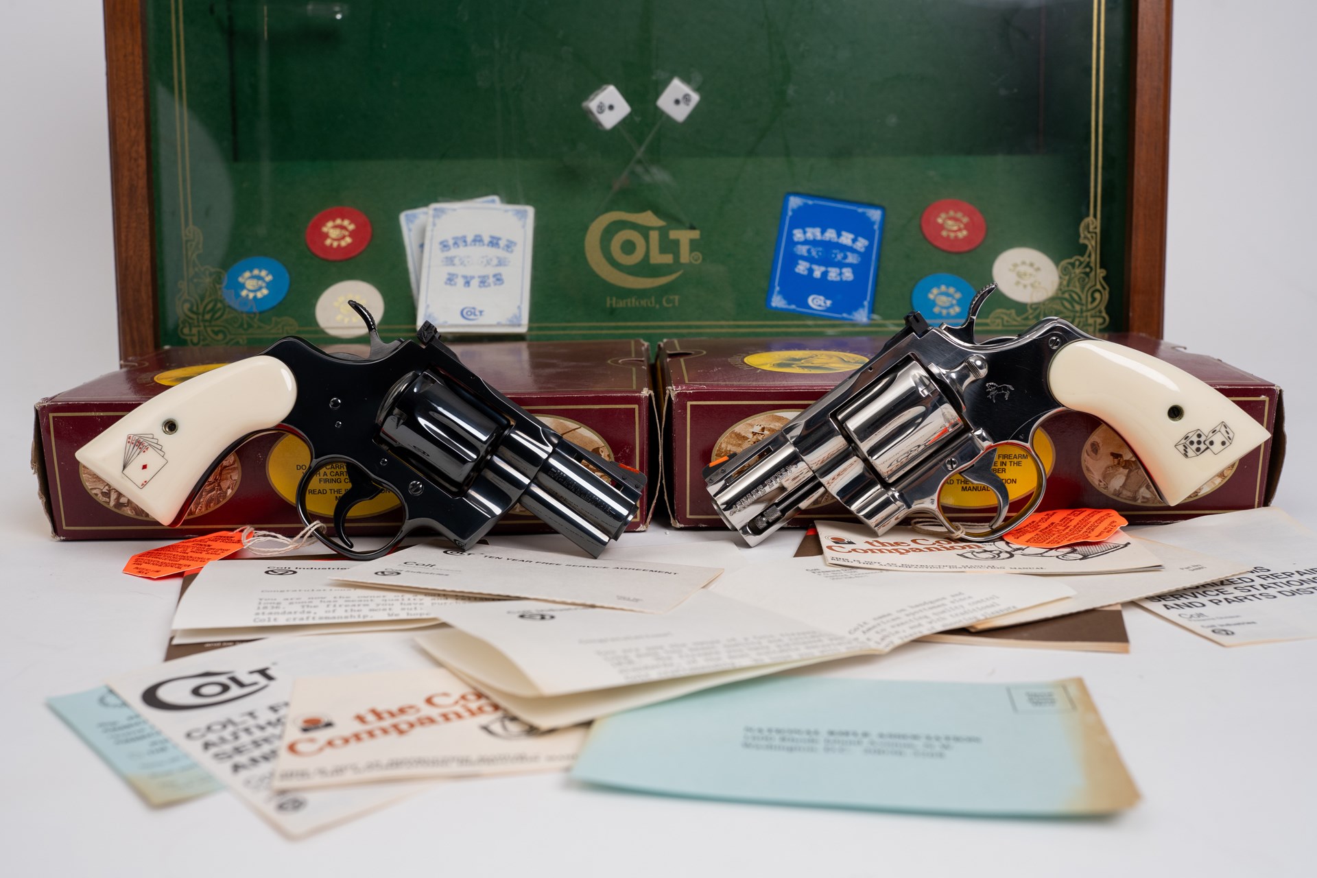 This rare matched pair of Colt Python Snake Eyes .357 Magnum 2.5” Double Action Revolvers is one of only 500 sets that were issued in 1989. The set is complete with its original display case and box.