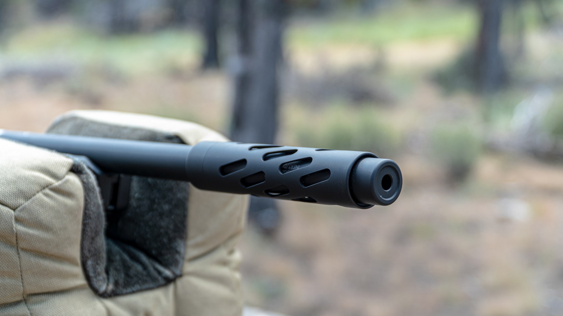 Close-up of the suppressor shroud on the Tactical Solutions Owyhee Magnum rifle.