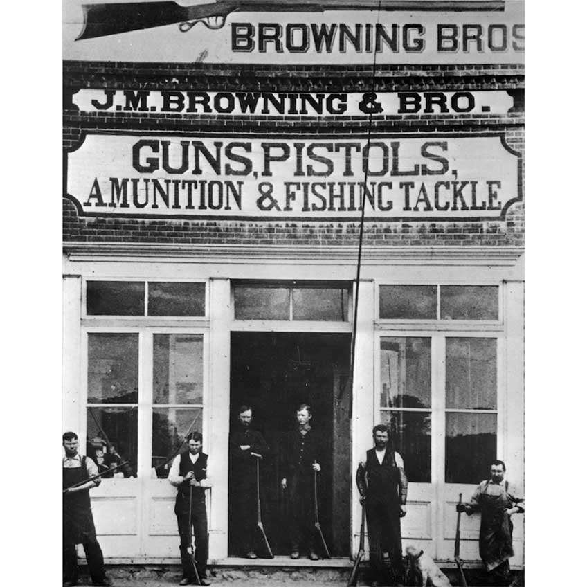 The first Browning storefront, circa 1879. John and Matt stand in the doorway, flanked by their brothers. Frank Rushton is on the far right. All are holding the first Browning rifle, the famous single-shot. It is still in production. Image courtesy of the Utah State Archives