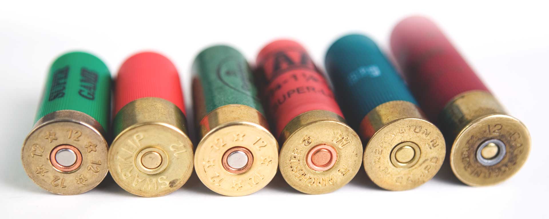row of shells ammunition six cylinders shotgun shotshell
