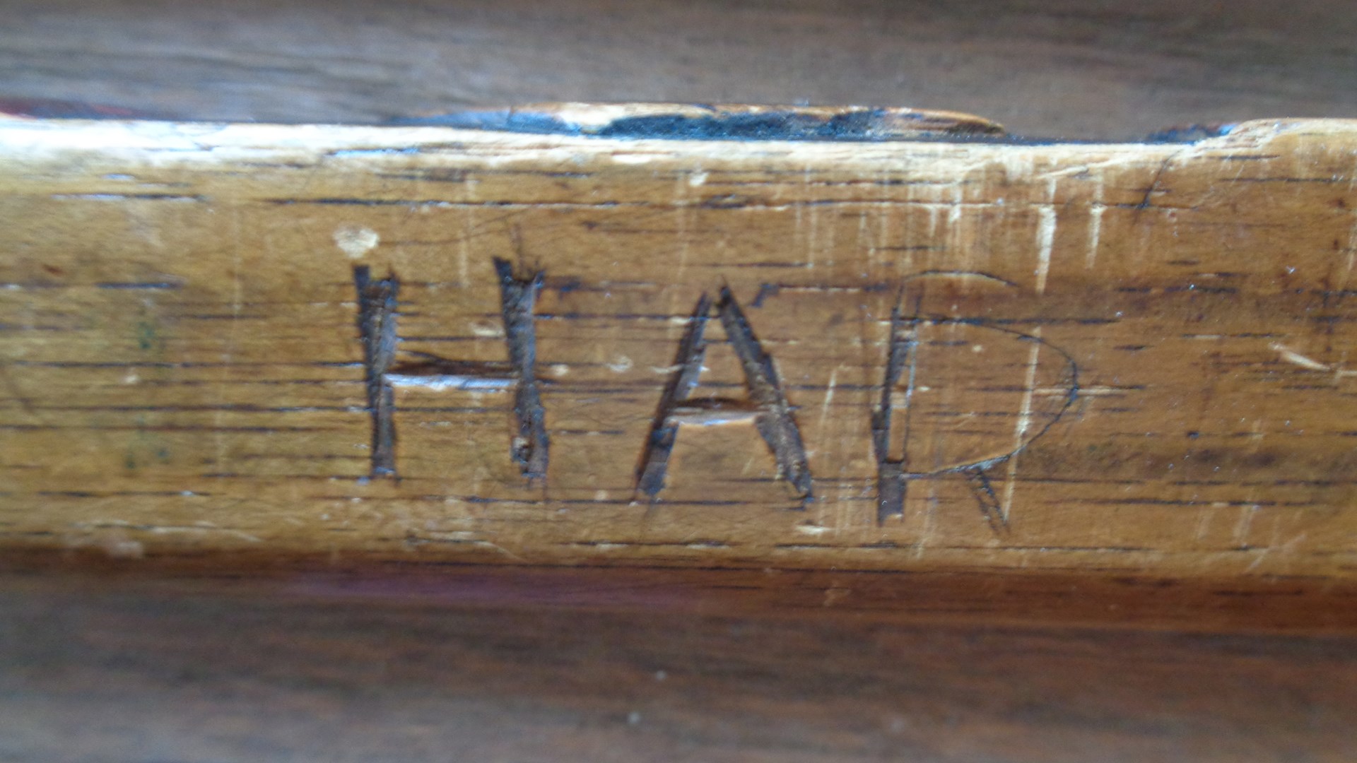 The initials of an unknown previous owner on this cane proved to be the catalyst for the realization that the initials, “JH,” were on a piece of paper, and not in a carving under the Frankenspencer’s barrel. Image courtesy of author.