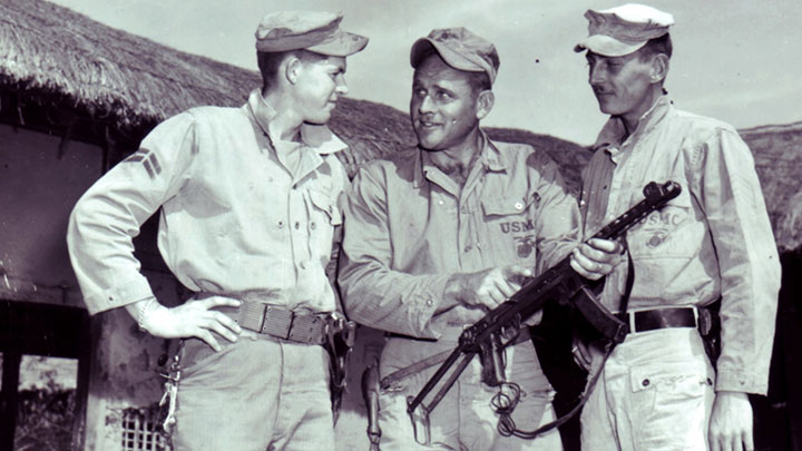 Marines pose with a captured PPS-43 submachine gun (7.62x25 mm) during 1952.