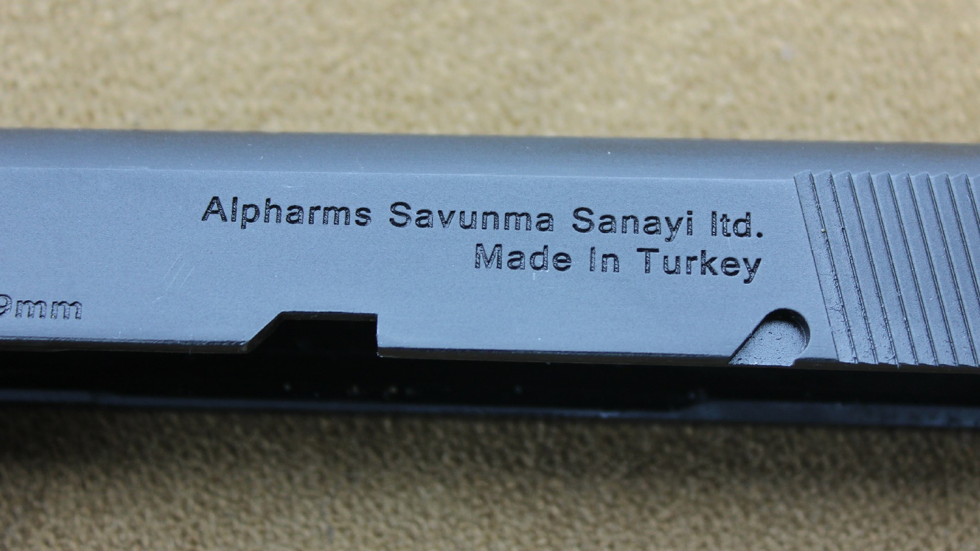 Centurion 11 pistol closeup slide stamping