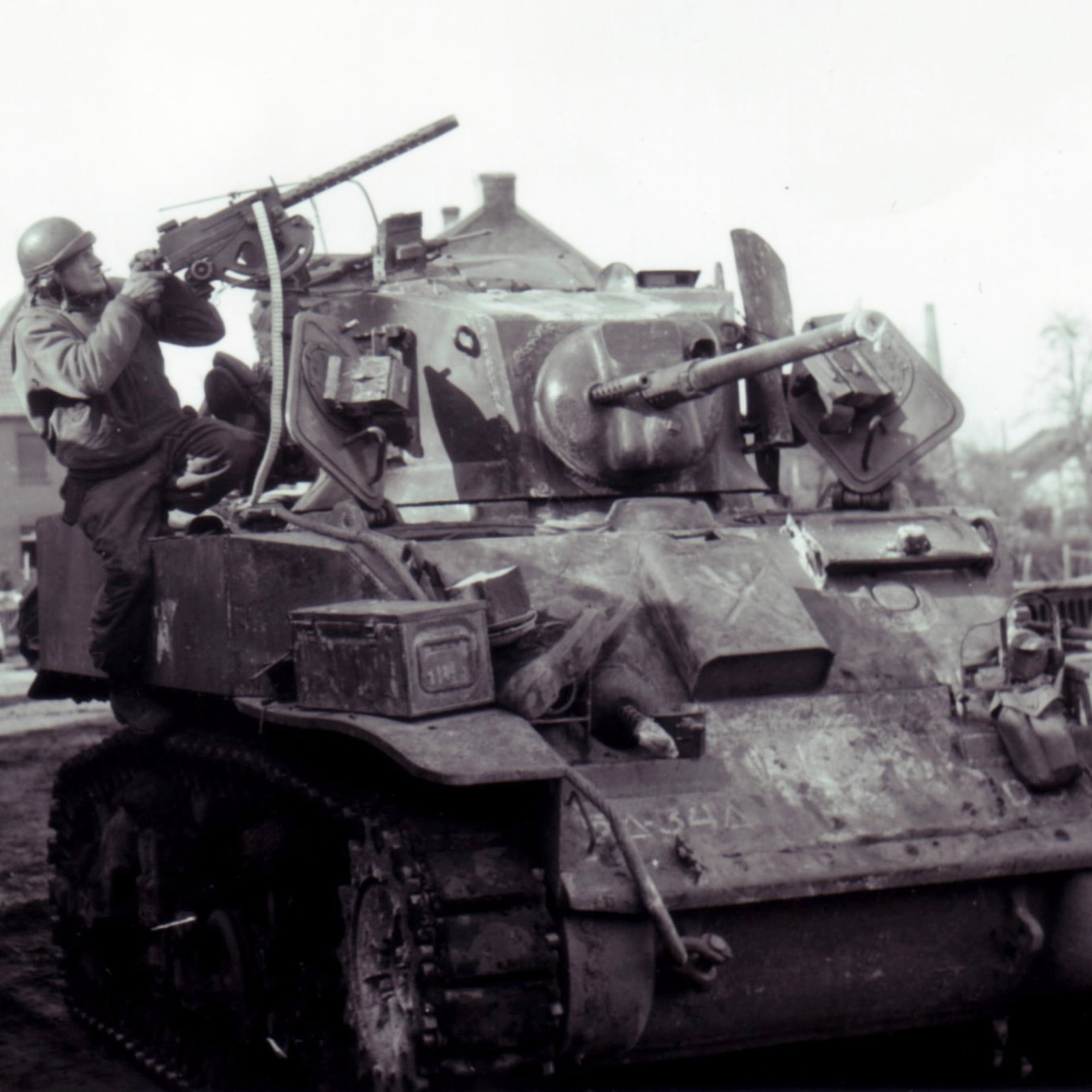 The turret-mounted Browning .30 caliber M1919 in use by a M5A1 tank commander of the 2nd Armored Division at Viersen, Germany during March 1945. Note the M1 Carbine on the roof, and the co-axial and bow-mounted .30 Cal MGS.