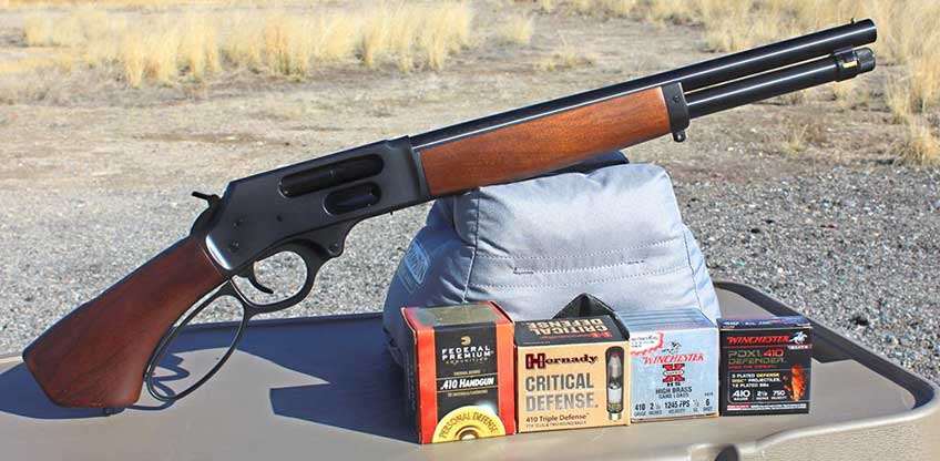 outdoor shooting range gun on bench sandbag ammunition display