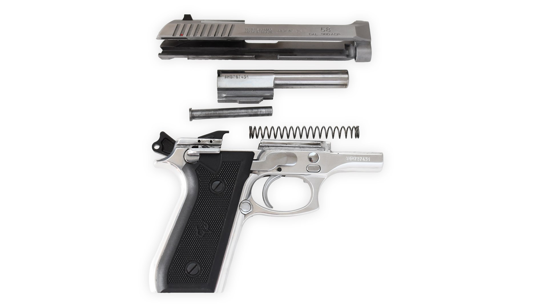 Taurus Model 58 right-side view gun handgun silver finish parts disassembled arranged slide barrel recoil spring guide pin spring frame with black stocks