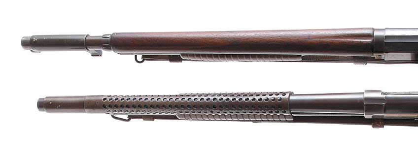 Unlike the familiar ventilated, stamped steel top handguard of the Model 1897 (above), the Remington Model 10 trench gun (top) used a wooden handguard as well as its own pattern of bayonet lug to accept the U.S. Model 1917 bayonet.