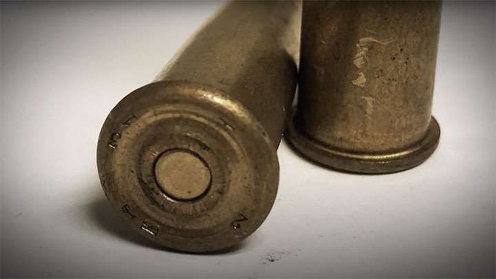 The angular ring on the back of 8 mm Lebel cartridges meant to keep the tips of bullet from igniting the primers when leaded into the M1886 tube magazine.
