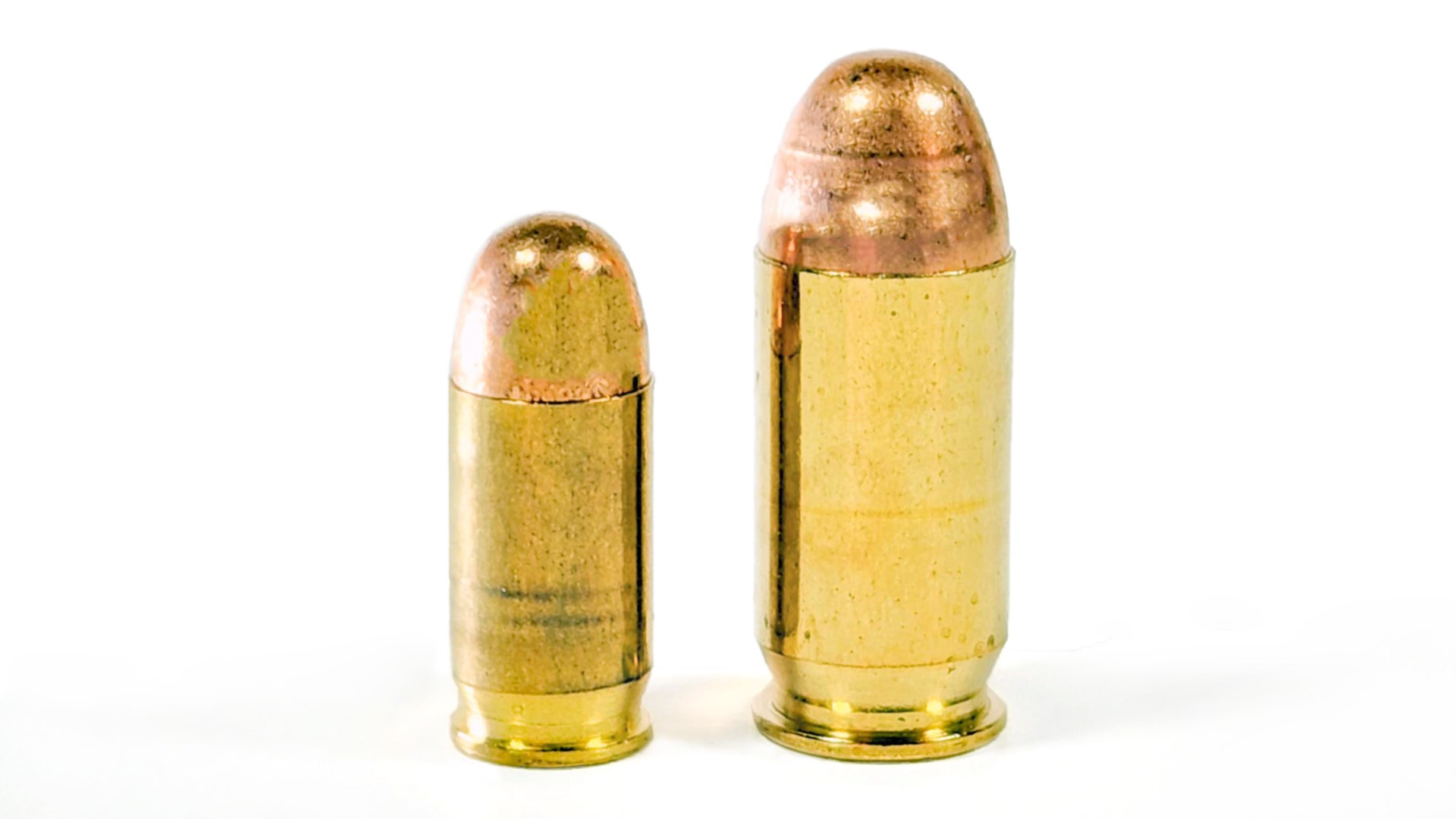 380 acp handgun cartridge bullet left and 45-cal .45 ACP cartridge shown on right brass bullets guns ammo