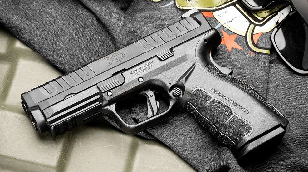Springfield Armory XD mod.3 black gun left-side view shown with shirt glasses