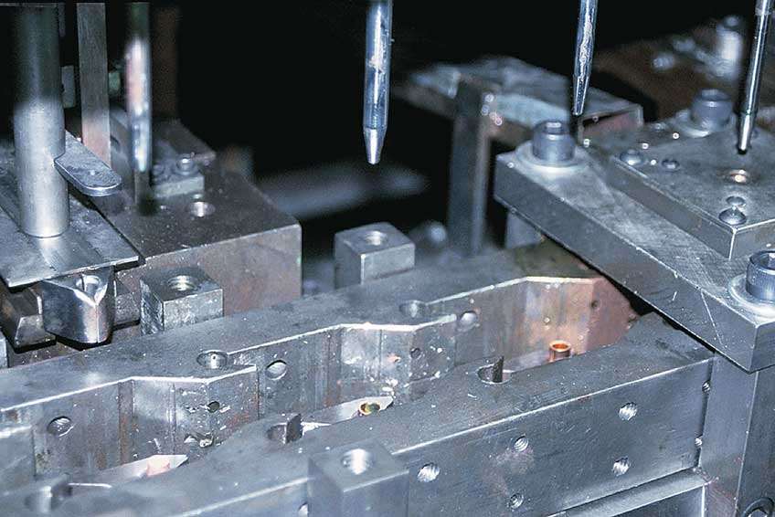 Involved are numerous high-speed automated processes, including jacket drawing. Of course, numerous steps are not shown here, including the one that many manufacturers would rather not divulge: that of the process by which the core and jacket materials are bonded to form an inseparable projectile that will not come apart on impact.