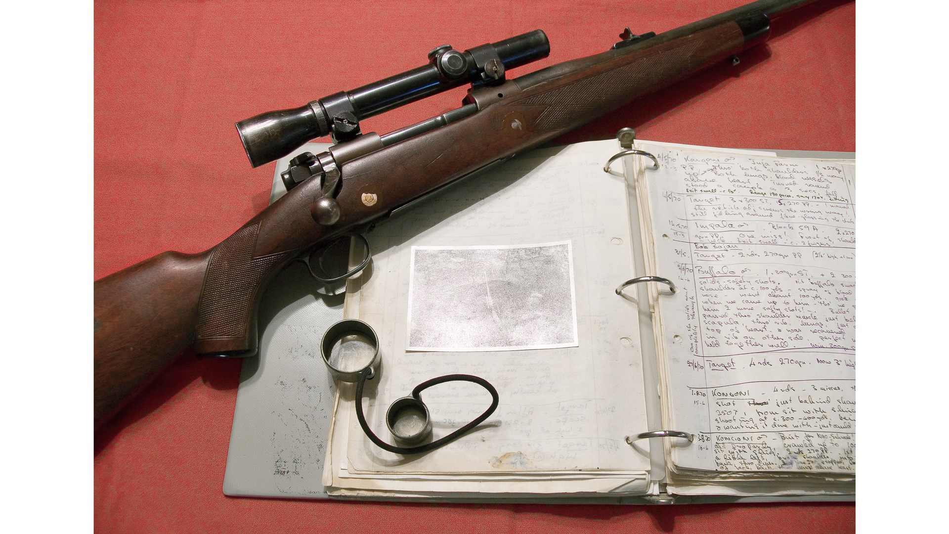 Winchester Model 70 bolt-action rifle on a hunting journal of Finn Aagaard's