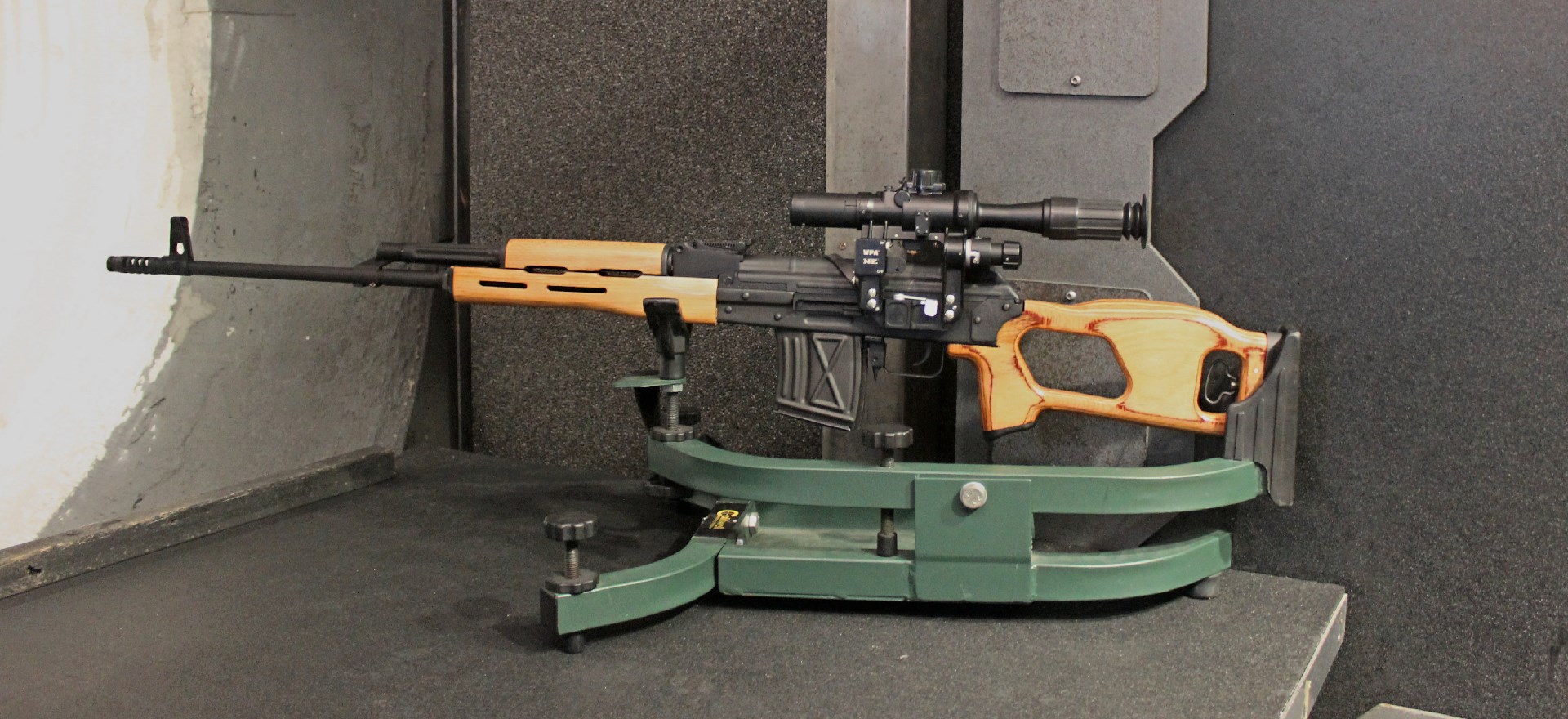 Century Arms PSL 54 in metal cradle on shooting range