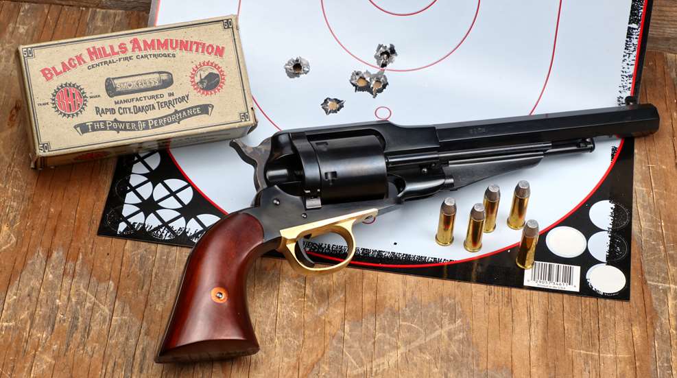 Cimarron 1858 Remington Navy Conversion right-side shown with ammunition target bullets