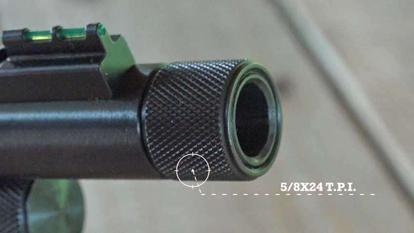 round steel dark blue metal barrel gun rifle bore muzzle white text