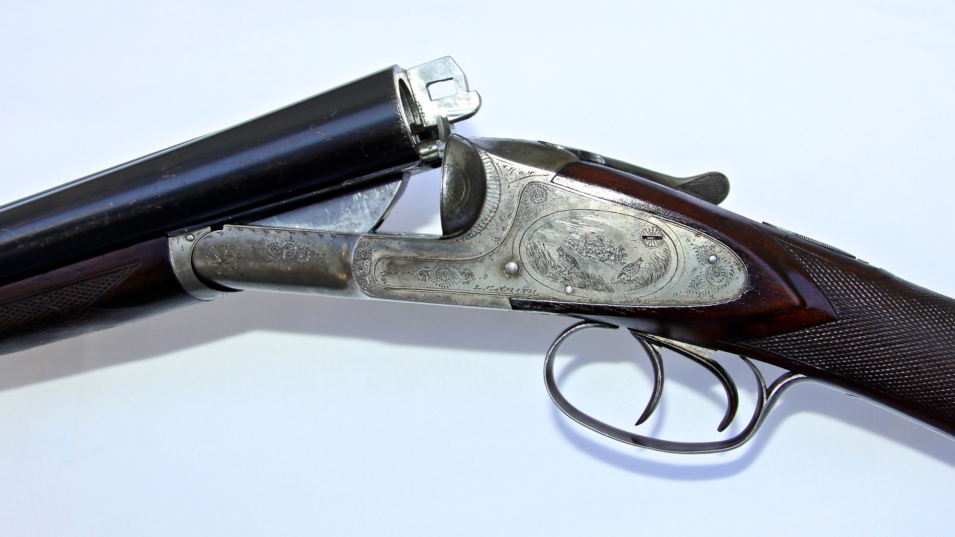 The L.C. Smith was America’s only authentic sidelock. Hacker’s No. 3E “Elsie” was made in 1902 and features hand-engraved game birds and precise wood-to-metal inletting