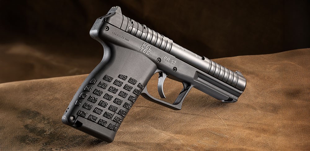 KelTec PR57 right-side view on leather black pistol angled down textured checkerboard grip gun 5.7x28mm FN