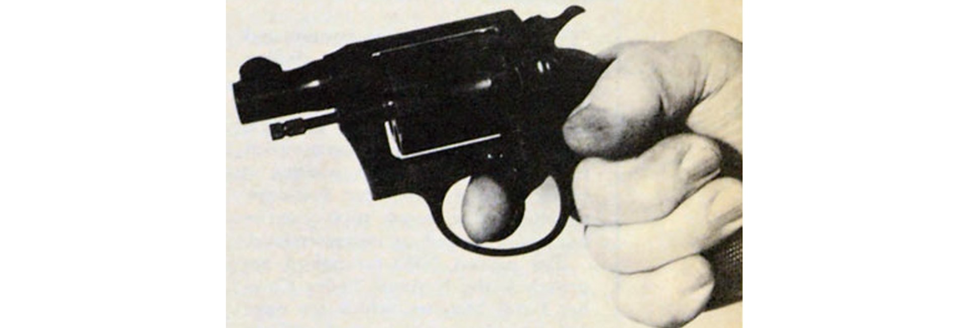 McGivern's hand demonstrates proper grip for double-action shooting with the revolver.