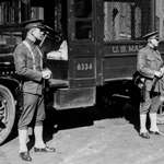 Marines are wearing Model 1911 pistols and carrying Winchester 12-ga. “trench guns.”