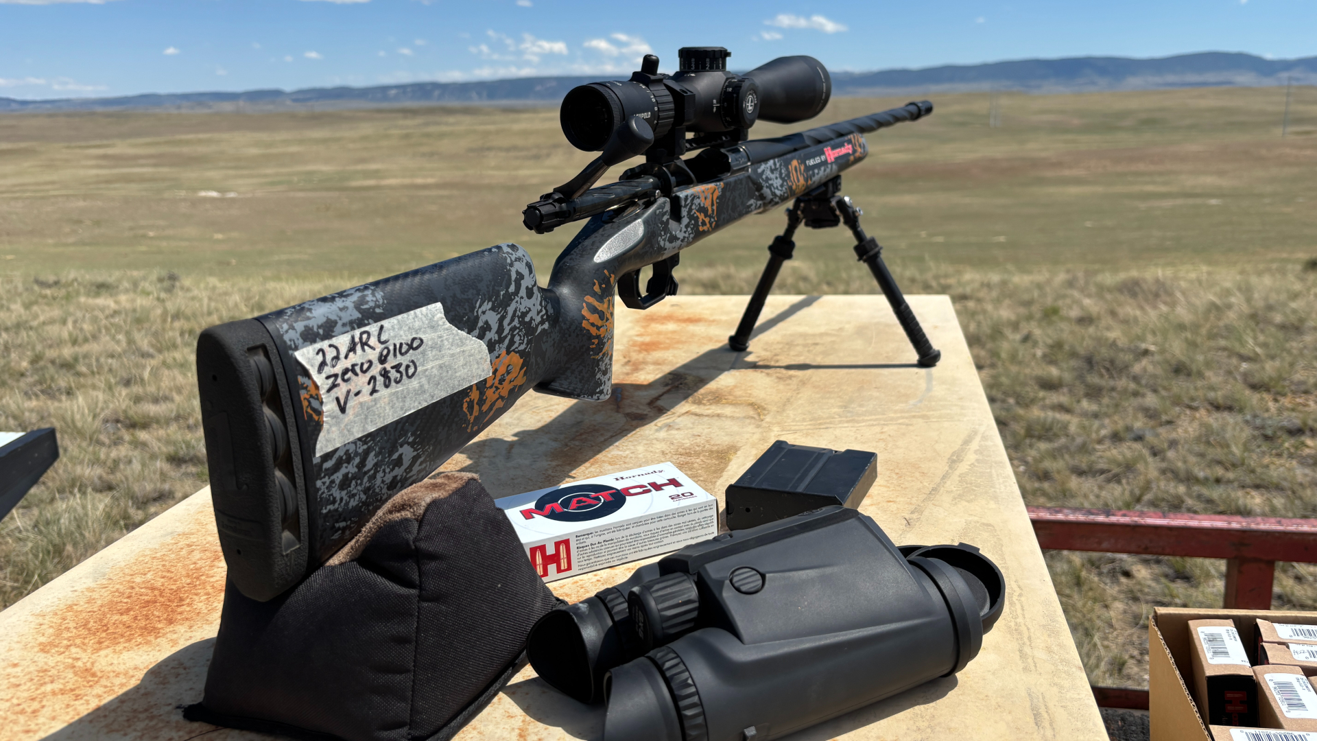 Long-range shooting from bench with binoculars