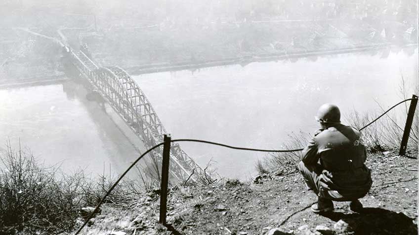 The view from the “Erpeler Lay” overlooking the Ludendorff bridge.  The high banks on either side proved an asset for American AA defense of the bridge.