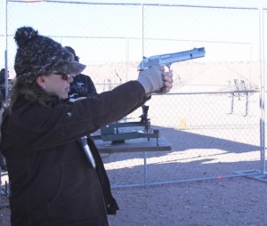 Barbara Baird shooting a Desert Eagle.