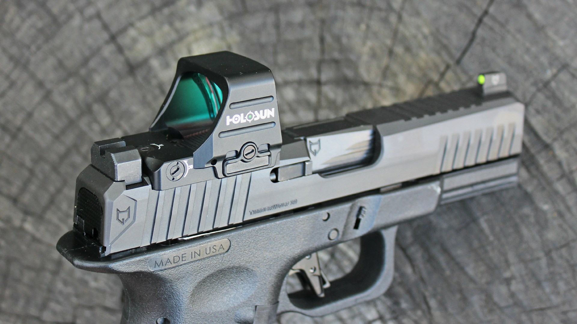 Lone Wolf Timberwolf 19X pistol right-side quartering view shown with red-dot Holosun optic attached to rear of pistol slide top