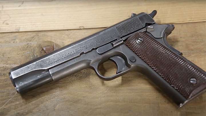 A M1911 pistol with World War I-era Remington UMC slide.