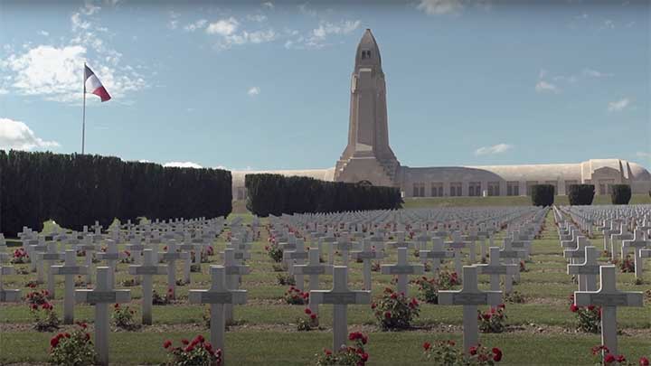 The Verdun cemetery with the Douaumont Ossuary at the top of the hill as seen today.