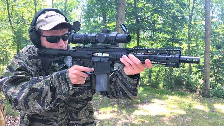 Big Horn Armory AR500 pistol being used in field expedient firing position at Echo Valley Training Center.