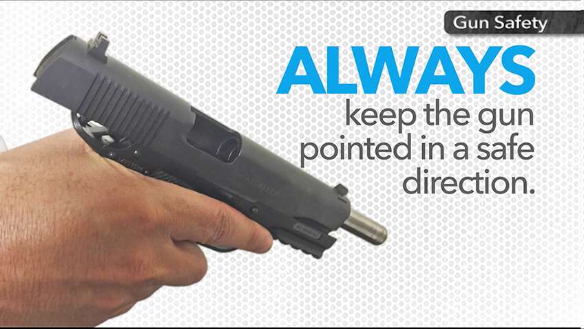 Gun in hand with text noting &quot;Always keep the gun pointed in a safe direction.&quot;
