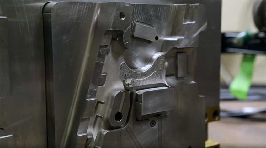 Inside of the mold used to form Smith &amp; Wesson M&amp;P pistol frames.