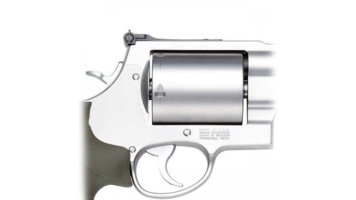 Cylinder, rear sight, hammer spur and trigger guard of the Smith &amp; Wesson 460XVR revolver shown on white.
