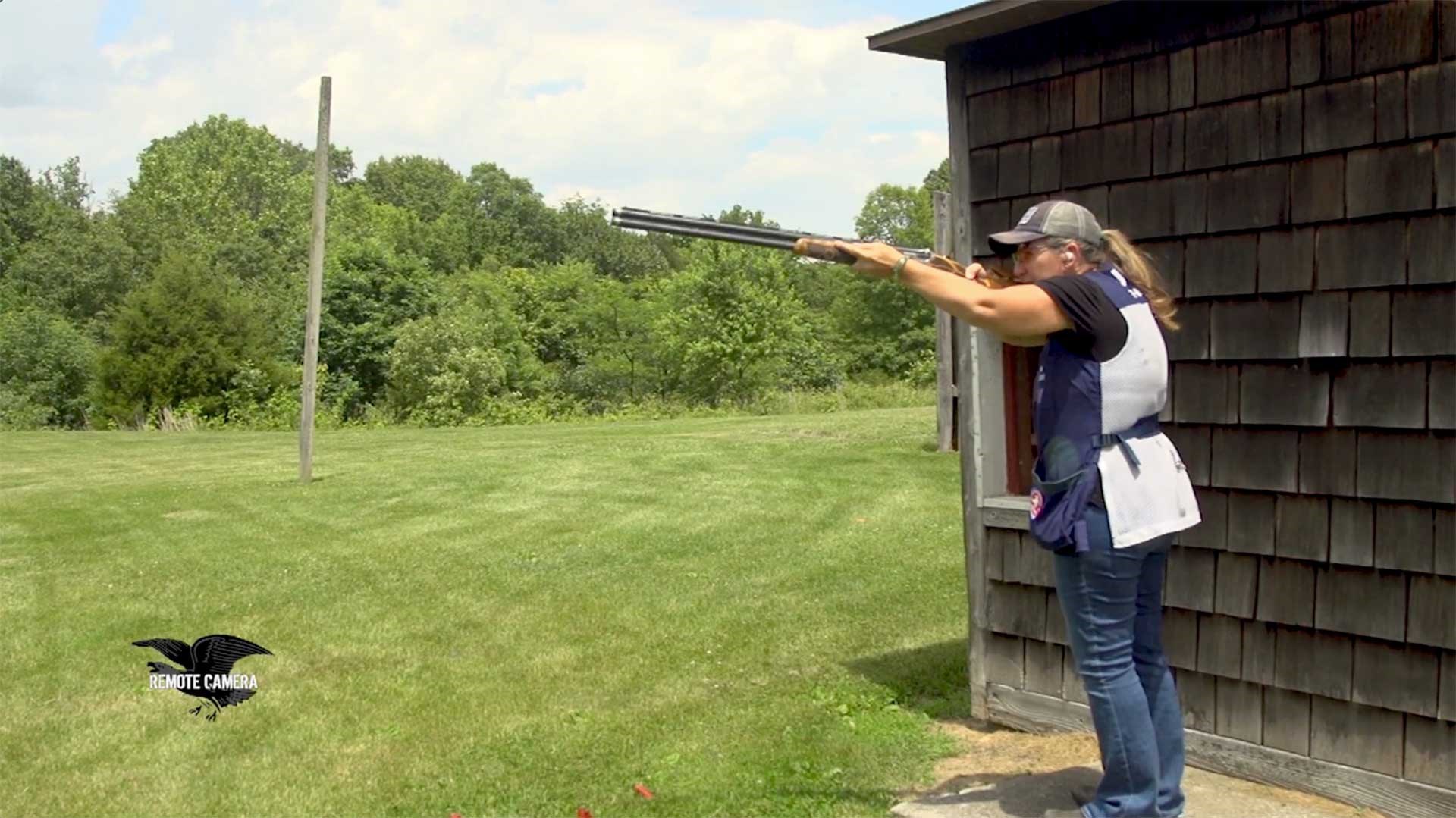 Olympic shooter Kim Rhode aims a shotgun from Position 7 on a skeet range.