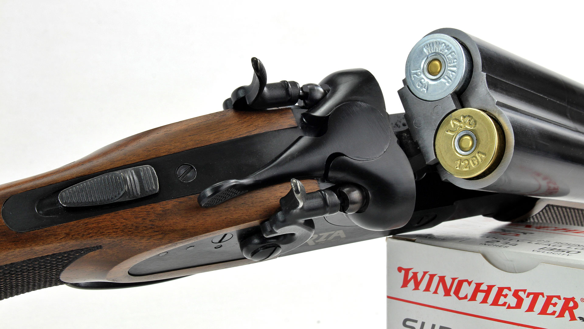 Rock Island Armory Side-By-Side 12 gauge shotgun double barrel view of open chamber with two shells loaded in.